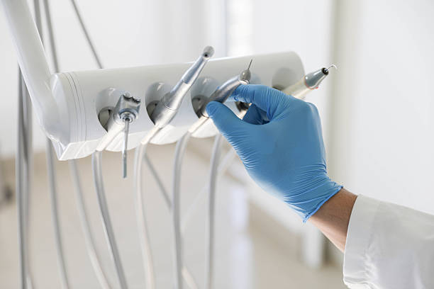 Professional Dental technician working in Laurie, MO